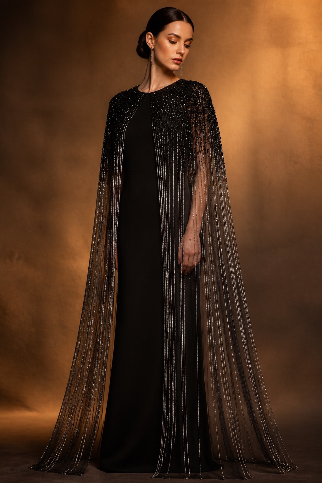 Beaded evening cape with silver fringing